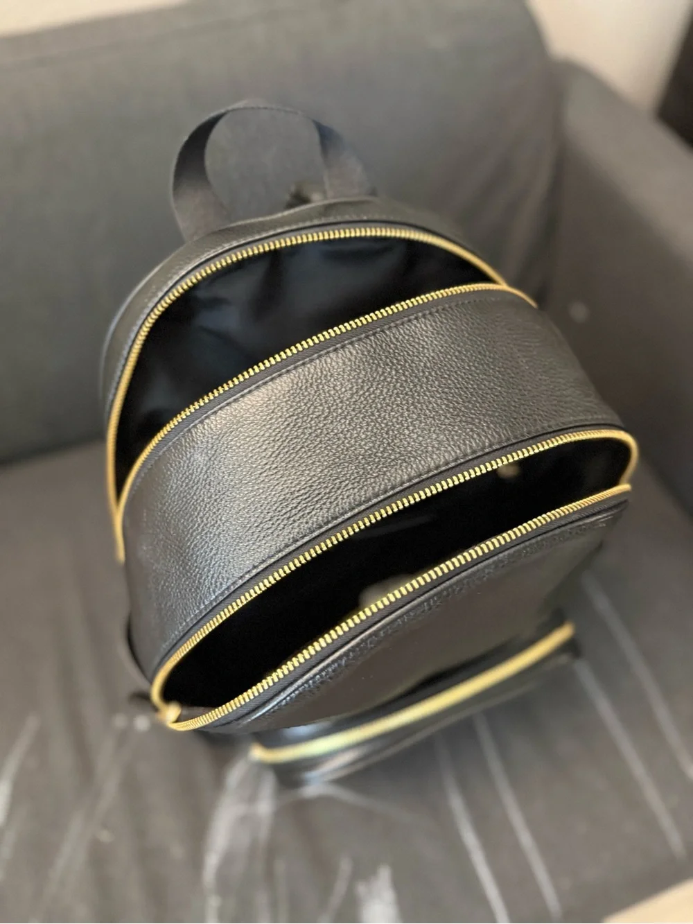 Coach Black Pebbled Leather Zip-Front Backpack with Gold Hardware